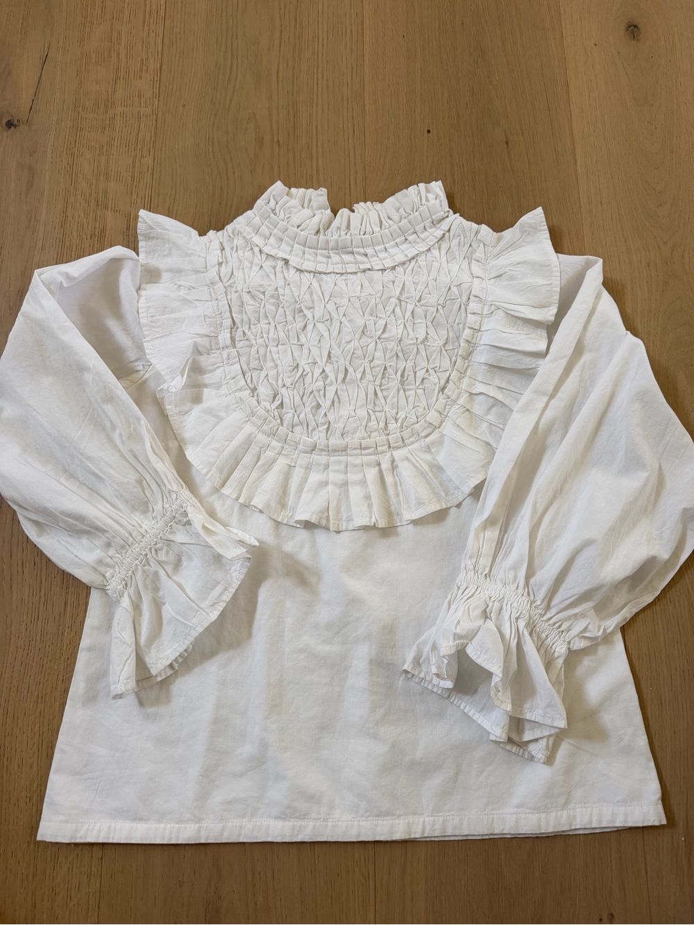 Elizabeth Wilson Designs high neck white ruffle top